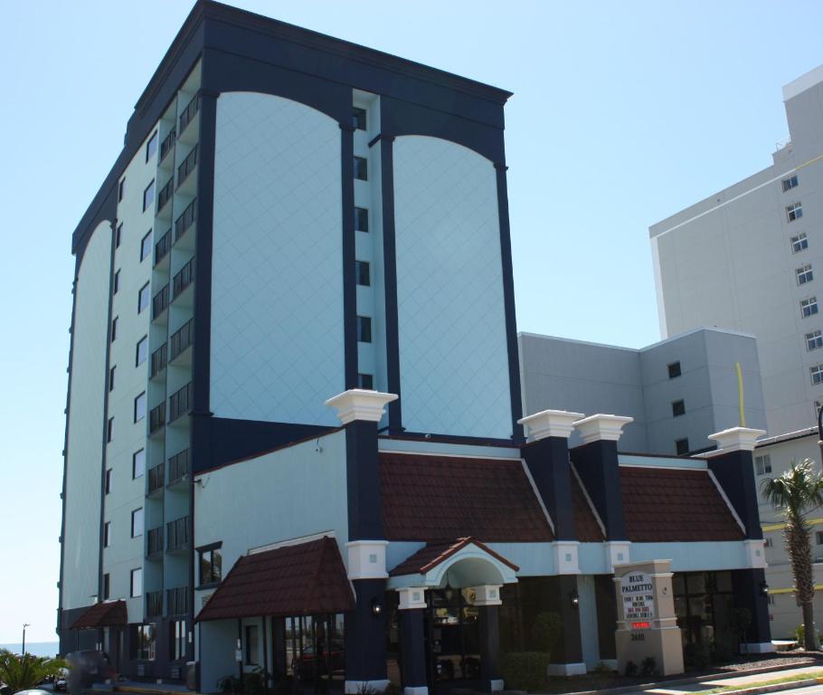 a large building with a large window at Blue Palmetto in Myrtle Beach