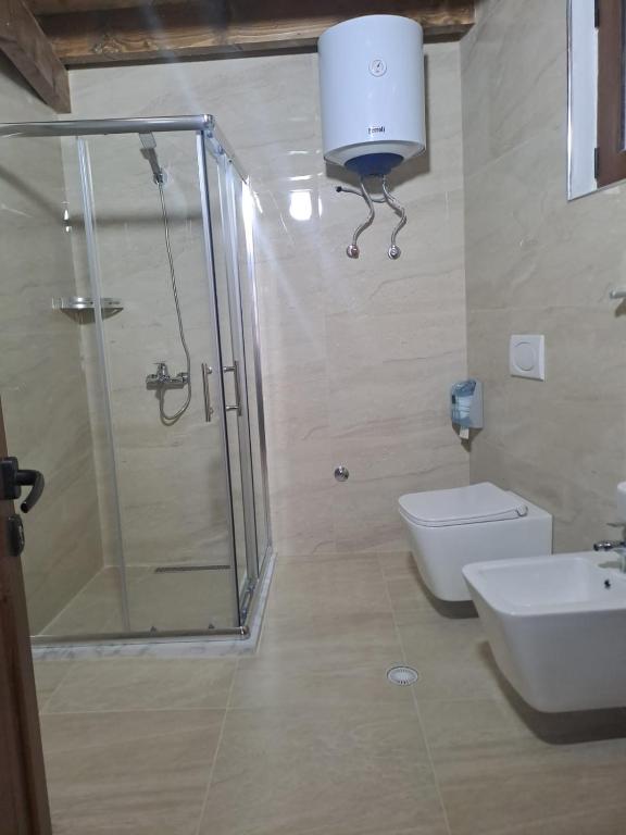 Koupelna v ubytování Hotel Demaj