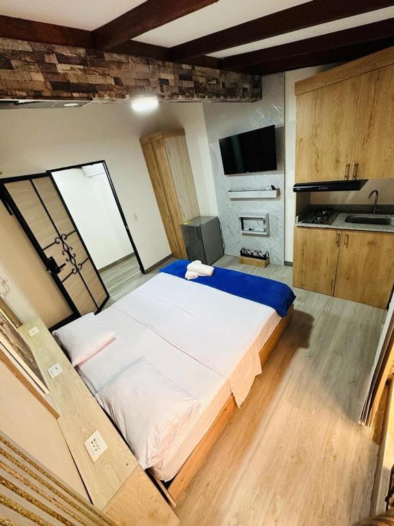Postel nebo postele na pokoji v ubytování Hotel Lares 70 Laureles