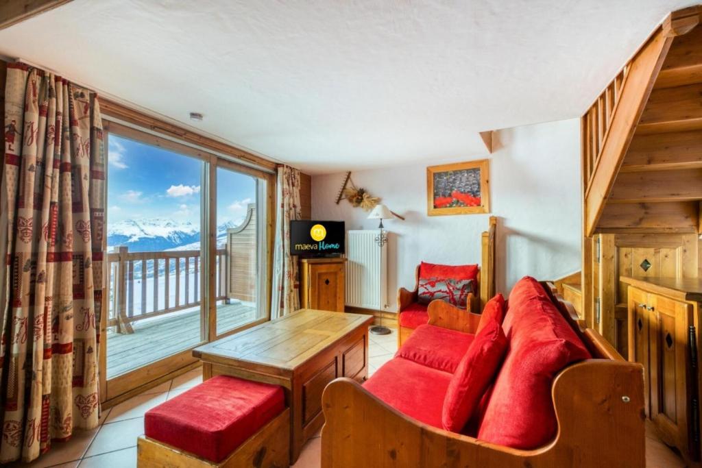 Televízia a/alebo spoločenská miestnosť v ubytovaní Résidence Les Alpages de Chantel - maeva Home - Appartement duplex 3 Pièces 6 Personnes - Sélection MAE-1638