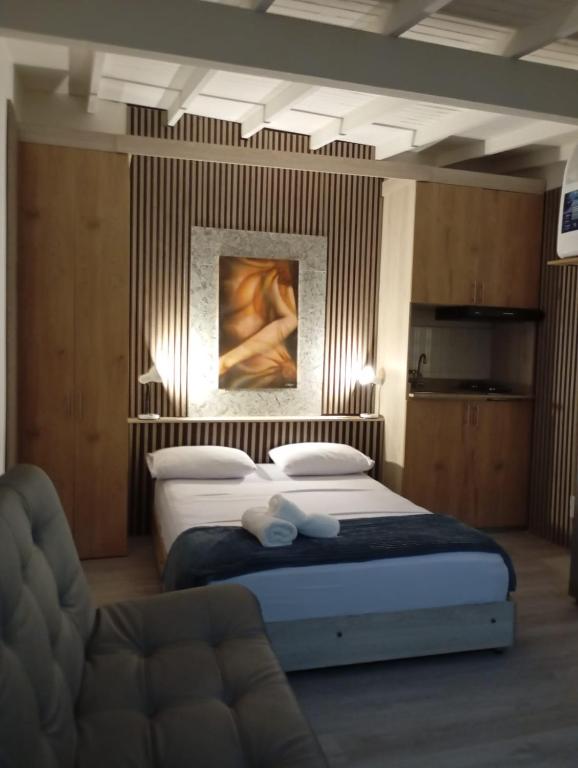 Postel nebo postele na pokoji v ubytování Hotel Lares 70 Laureles