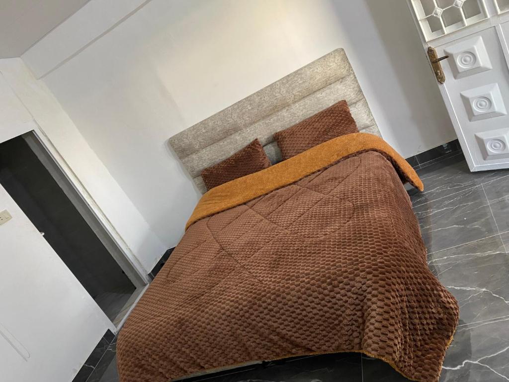 Postel nebo postele na pokoji v ubytování huseein rooms