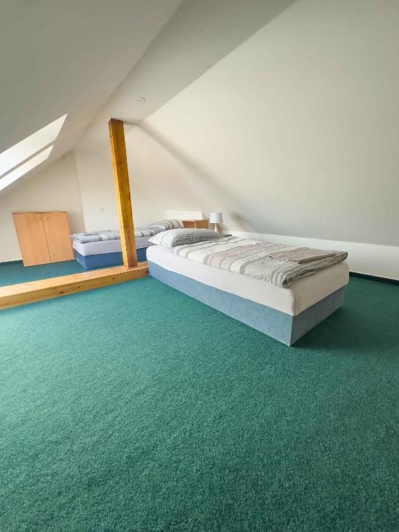 Postel nebo postele na pokoji v ubytování Minihotel Vitex