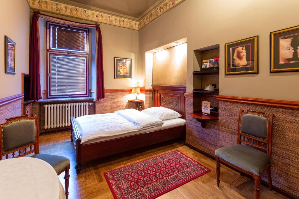 Postel nebo postele na pokoji v ubytování Hotel Continental