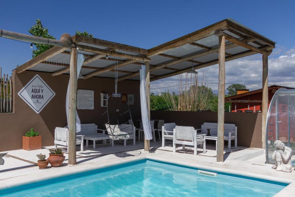 Bazén v ubytování Punta Piedra cabañas & suites nebo v jeho okolí
