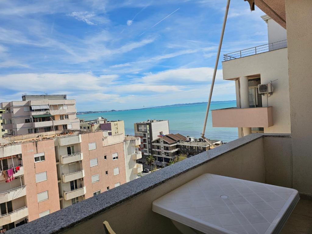 vistas al océano desde el balcón de un edificio en COASTAL APARTMENT 9th FLOUR, en Durrës