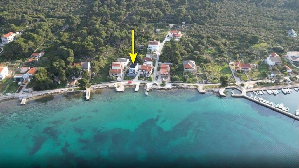 an aerial view of a small island in the water at Apartments by the sea Brgulje, Molat - 22856 in Brgulje