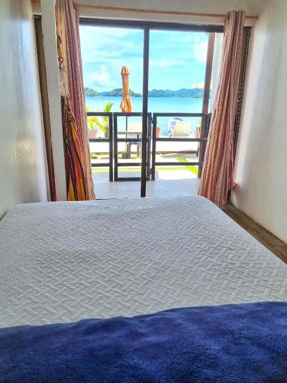 Postel nebo postele na pokoji v ubytování Casa Bajo Congo
