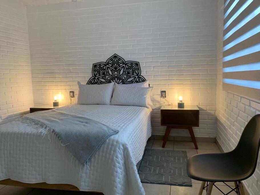 Кровать или кровати в номере Alojamiento en Tlaquepaque Céntro