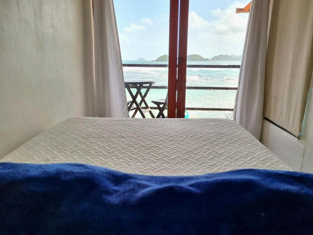 Postel nebo postele na pokoji v ubytování Casa Bajo Congo