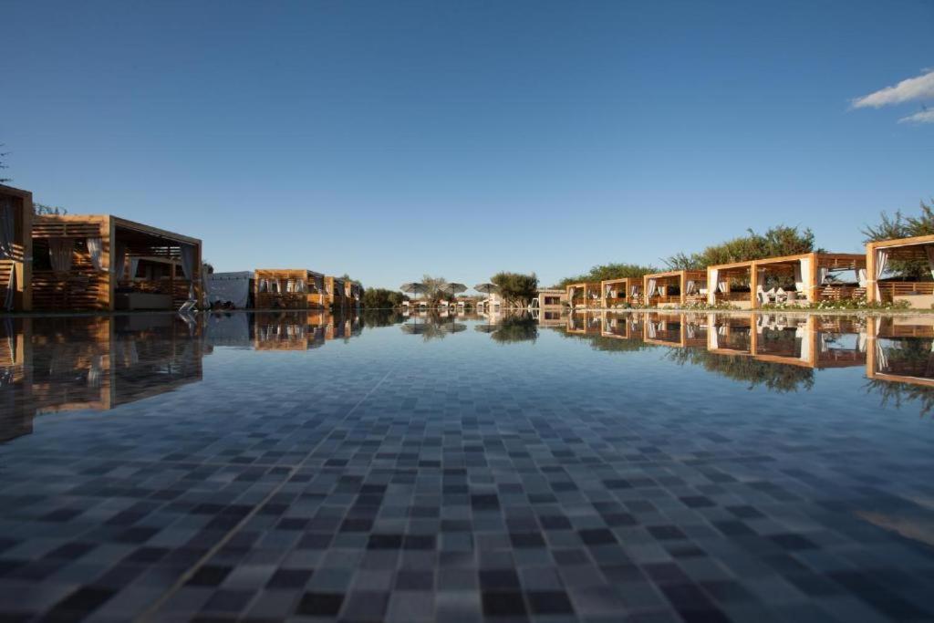 a view of a river with houses and buildings at THE FARM LODGES & Private pool in Marrakech