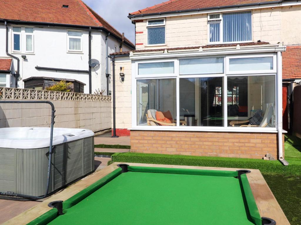 a pool table in the backyard of a house at 19 Slinger Road in Cleveleys