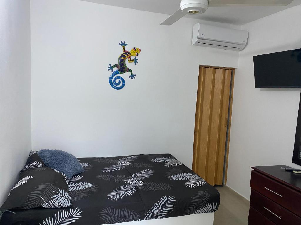 Postel nebo postele na pokoji v ubytování Hotel el Escondite