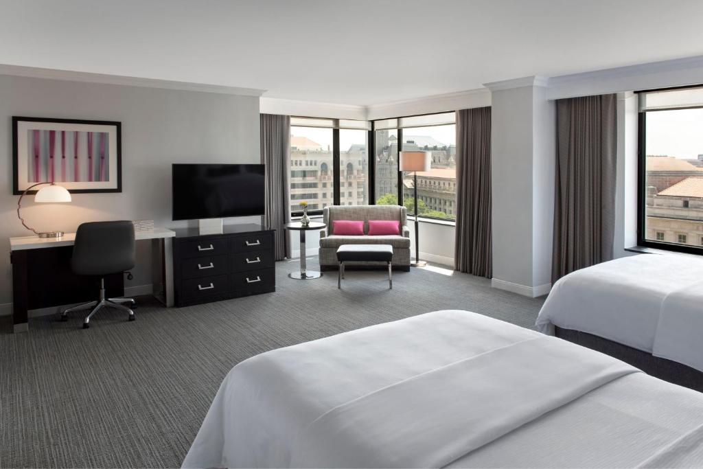 Postel nebo postele na pokoji v ubytování JW Marriott Washington, DC