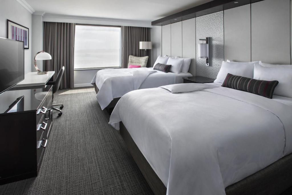 Postel nebo postele na pokoji v ubytování JW Marriott Washington, DC