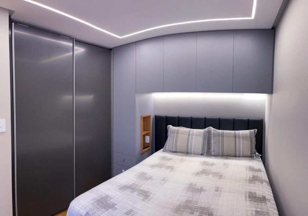 En eller flere senge i et værelse på Apartamento Ágape