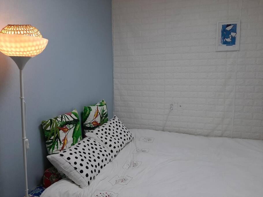 Postel nebo postele na pokoji v ubytování Sodamhang in Damyang