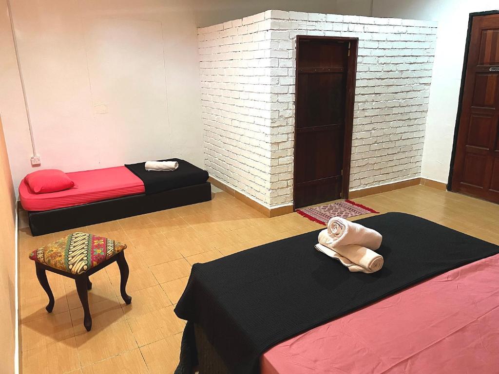 Postel nebo postele na pokoji v ubytování Home Sol Guesthouse
