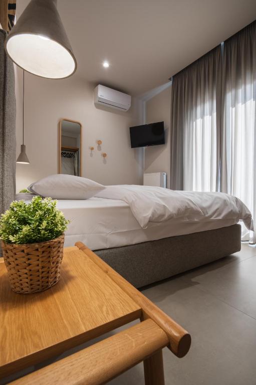 Postel nebo postele na pokoji v ubytování Palaia Luxury Suite