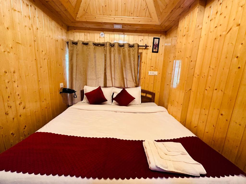 Postel nebo postele na pokoji v ubytování Hotel Avalanche