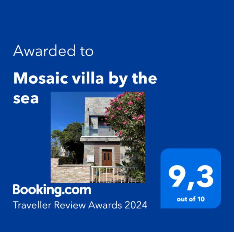 uma imagem de uma casa com o texto atribuído à villa em mosaico à beira-mar em Mosaic villa by the sea em Protaras