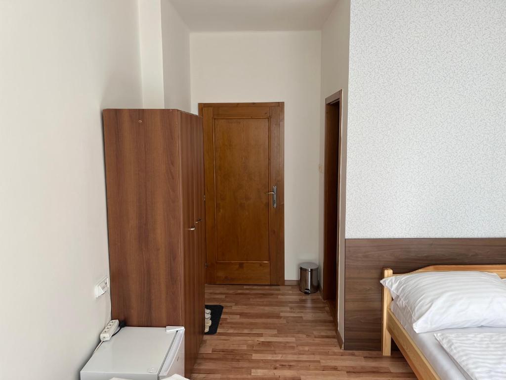 Postel nebo postele na pokoji v ubytování Penzion Znojmo