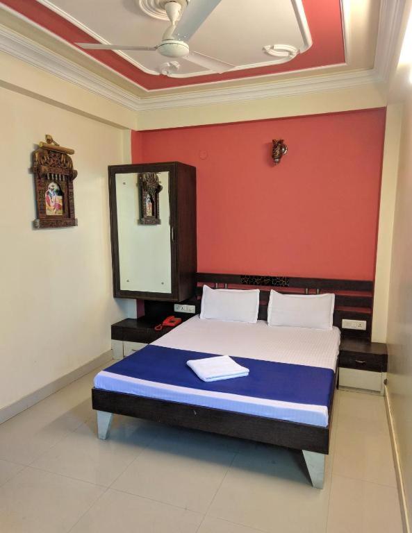 Postel nebo postele na pokoji v ubytování Panna Palace Guest House