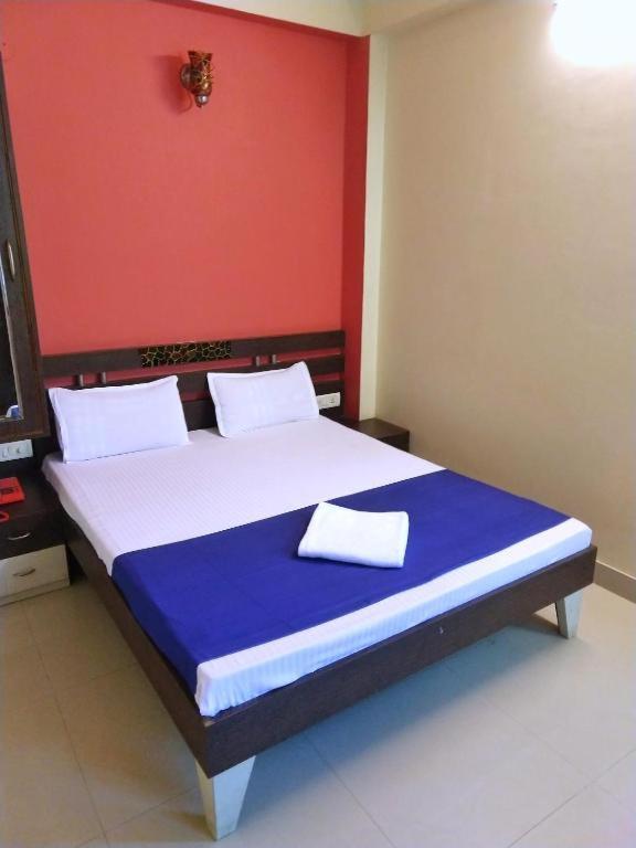 Postel nebo postele na pokoji v ubytování Panna Palace Guest House