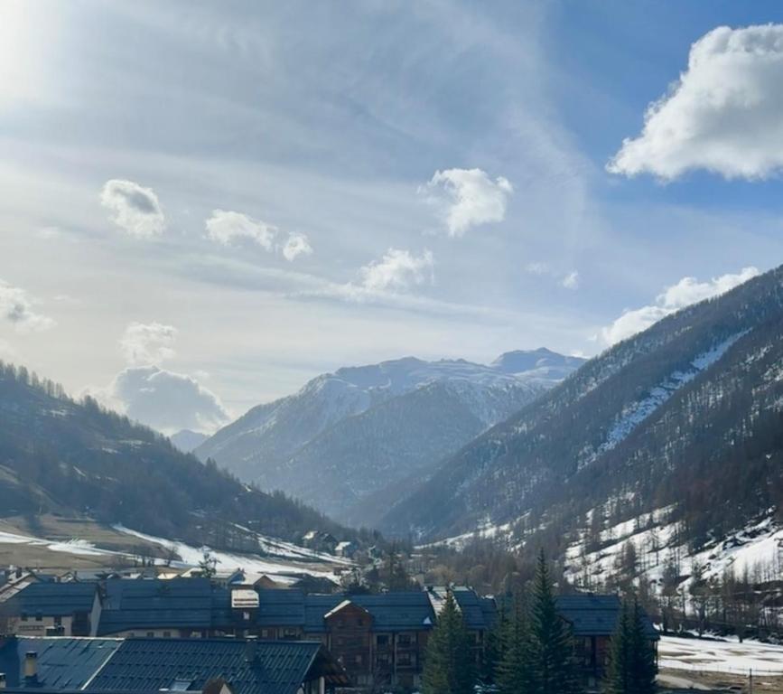 a view of a valley with mountains in the background at Studio Pablotin d’Abriès in Abriès