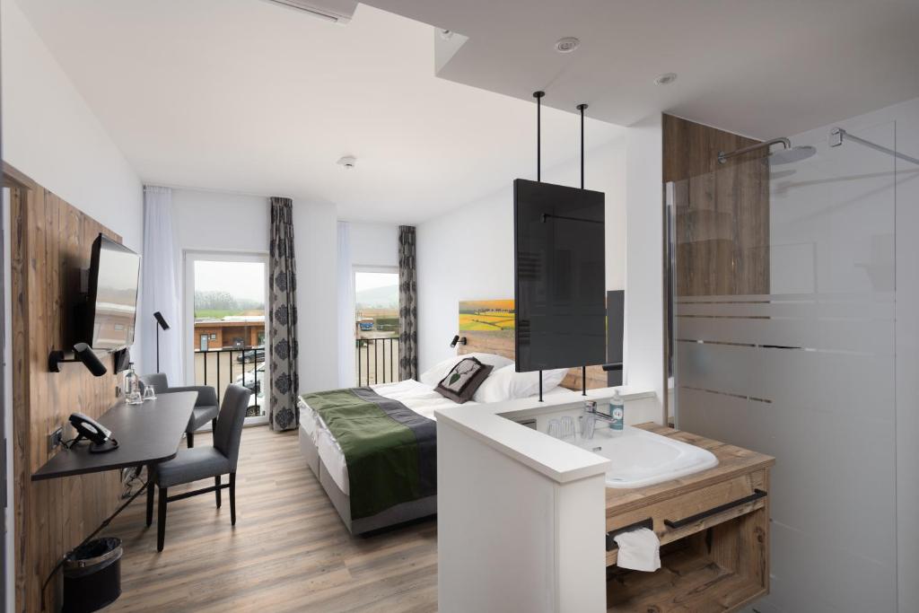 Posezení v ubytování Hotel Grohnder Fährhaus