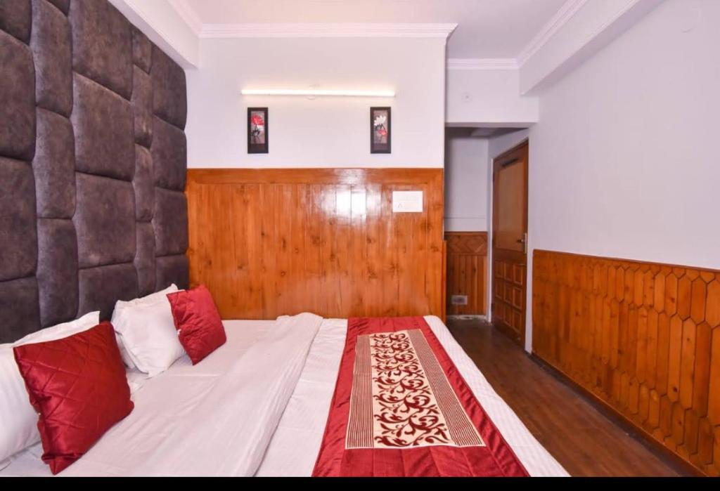 Postel nebo postele na pokoji v ubytování Hotel Avalanche