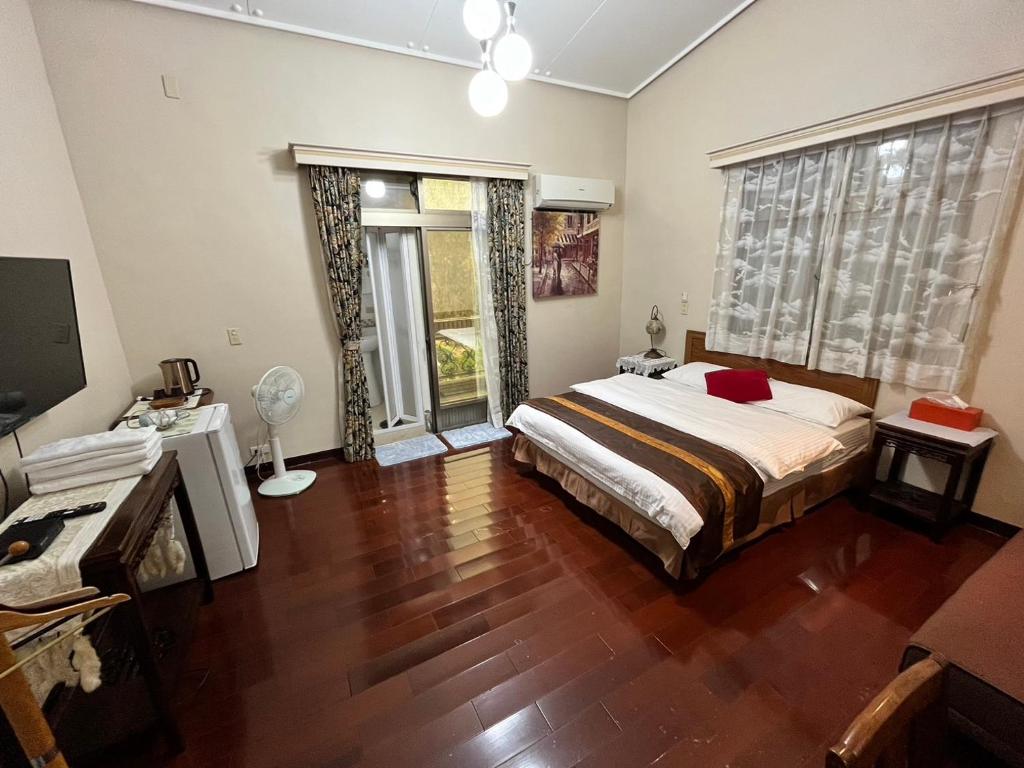 Postel nebo postele na pokoji v ubytování Yun Siang Ju Homestay