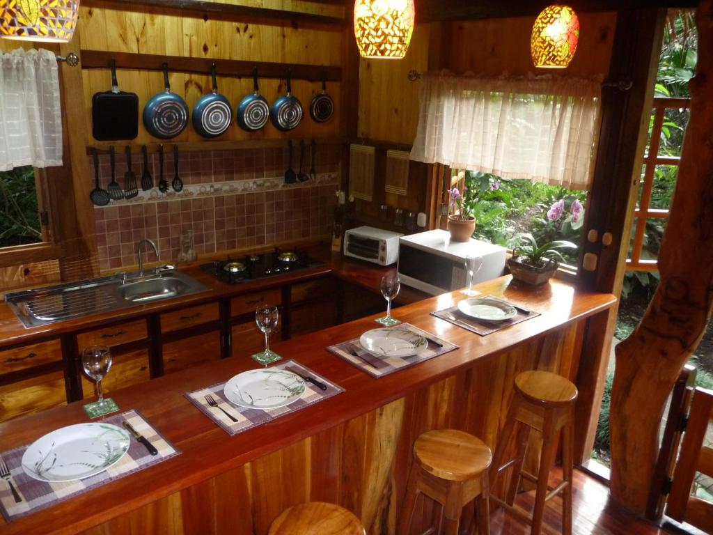 Kuchyň nebo kuchyňský kout v ubytování Topos Tree House