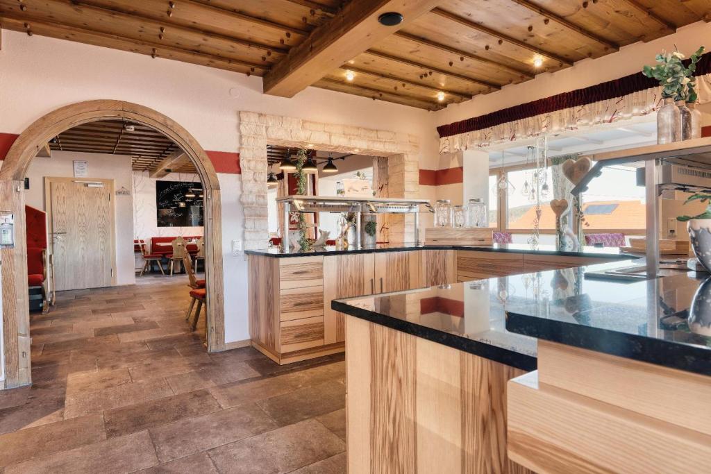Kuchyň nebo kuchyňský kout v ubytování Hotel Hirschenstein