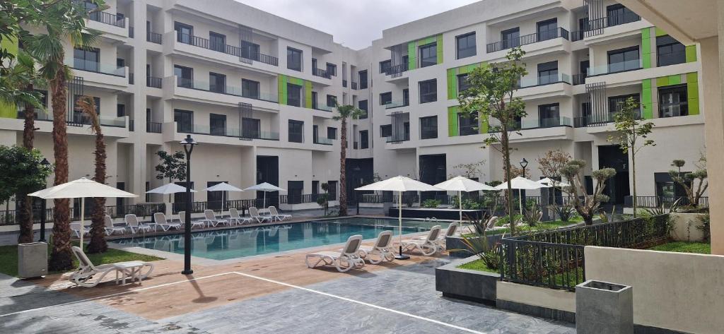 Kolam renang di atau di dekat Millénium vip parc appartement