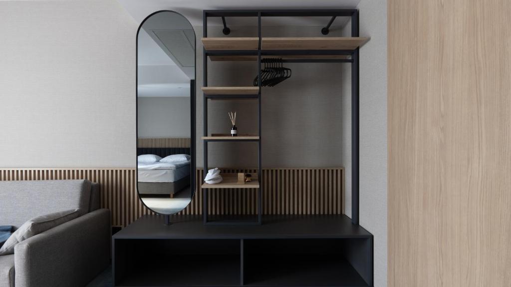 Postel nebo postele na pokoji v ubytování Umi Hotel Sopot