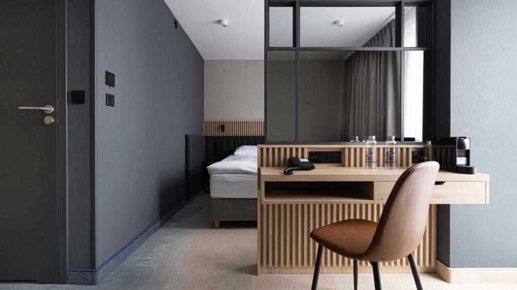 Postel nebo postele na pokoji v ubytování Umi Hotel Sopot