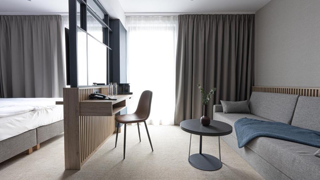 Postel nebo postele na pokoji v ubytování Umi Hotel Sopot