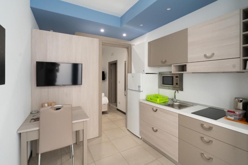 A kitchen or kitchenette at Notti Magiche