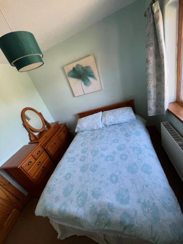 Postel nebo postele na pokoji v ubytování Runclevin House