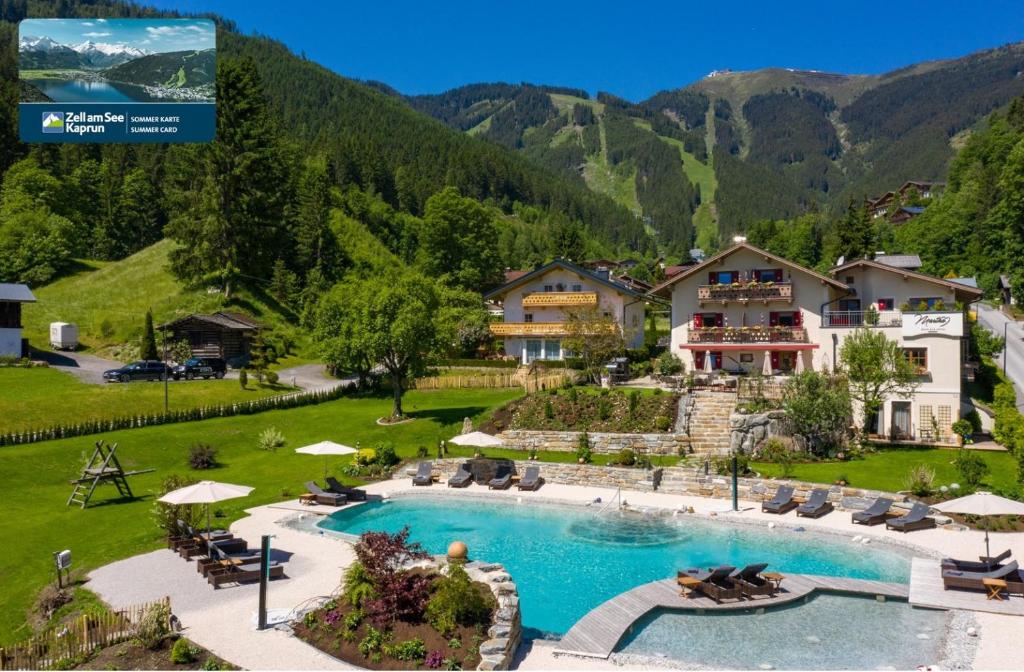 an aerial view of a resort with a swimming pool at Chalet "Villa Marlene" in Zell am See