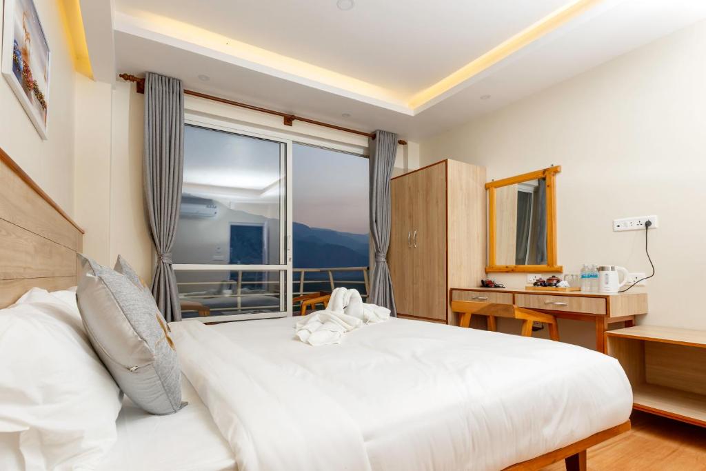 Llit o llits en una habitació de Samiyog Tourist Resort