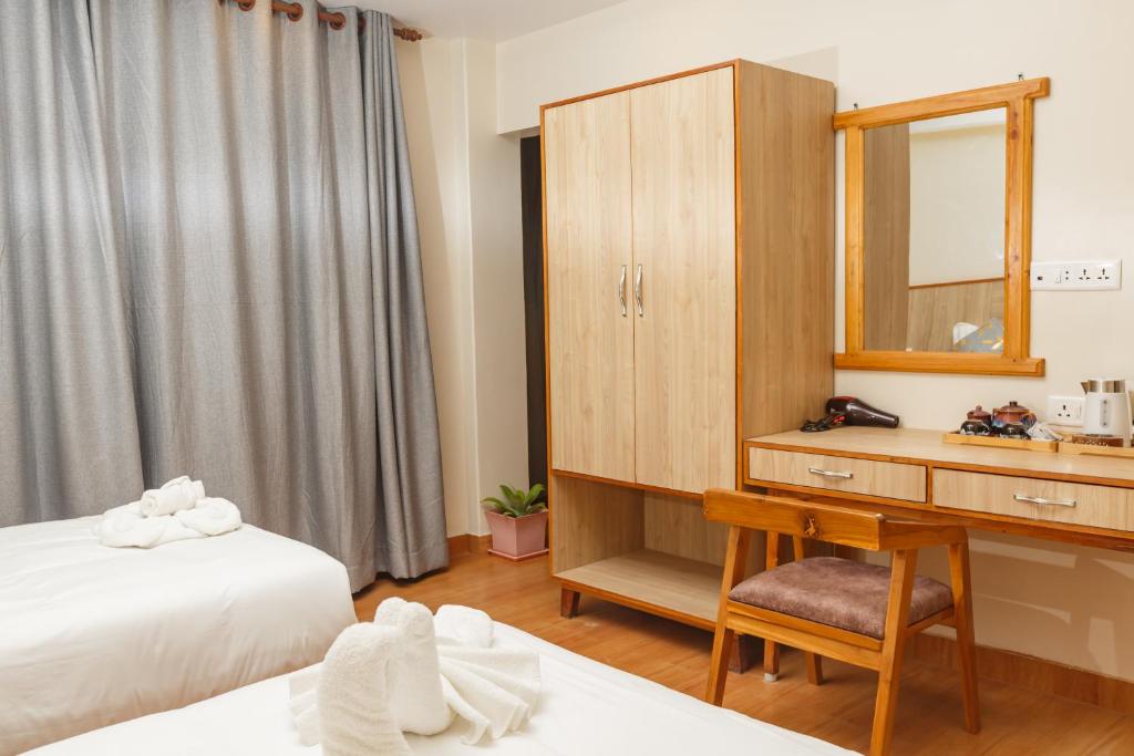 Llit o llits en una habitació de Samiyog Tourist Resort