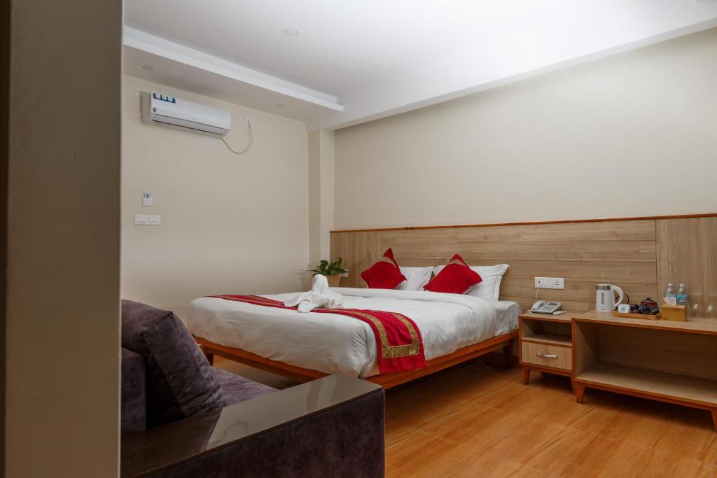Llit o llits en una habitació de Samiyog Tourist Resort