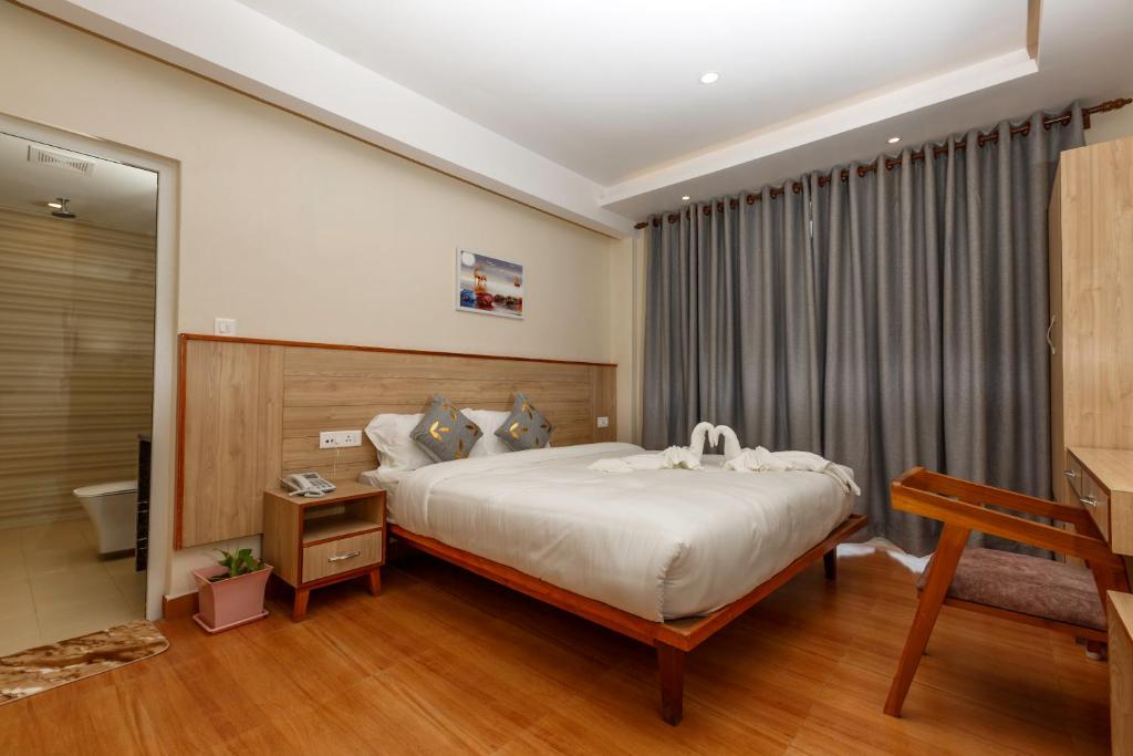 Llit o llits en una habitació de Samiyog Tourist Resort