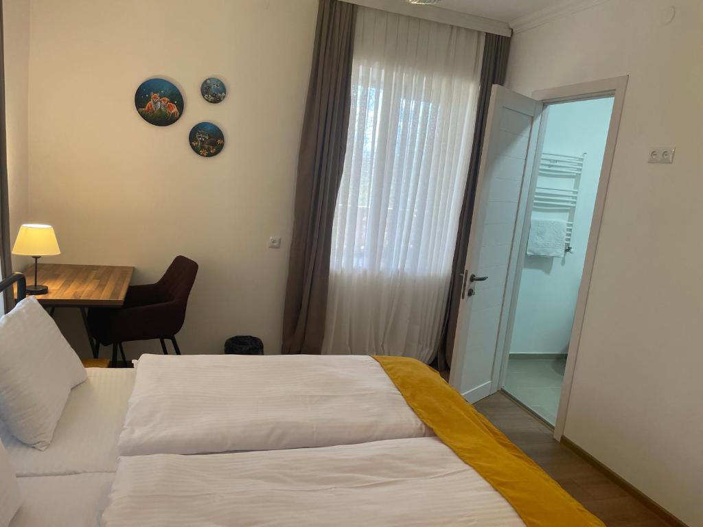Postel nebo postele na pokoji v ubytování Friendly Home