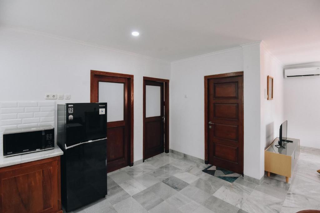 Kuchyň nebo kuchyňský kout v ubytování Padma Amita Yogyakarta