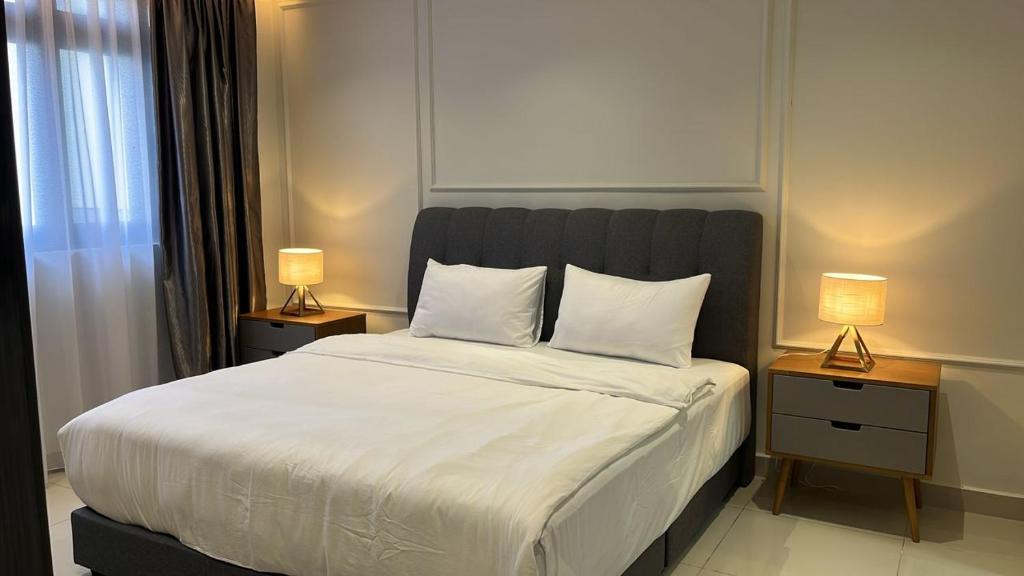 Postel nebo postele na pokoji v ubytování JL LUXURY BNB