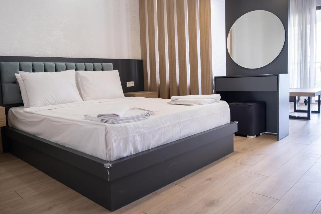 Cama ou camas em um quarto em Si Hotel&Spa