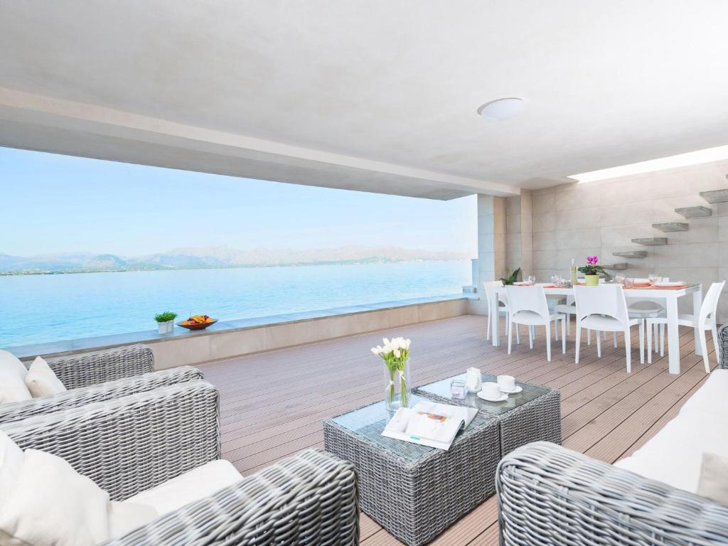 a living room with a view of the ocean at Aixa - House In Marina Manresa Free Wifi in Alcudia